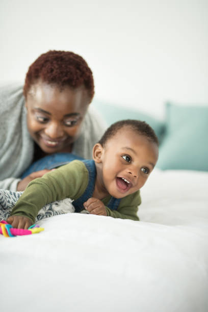 istock Trying to escape from the tickle monster 1134273468