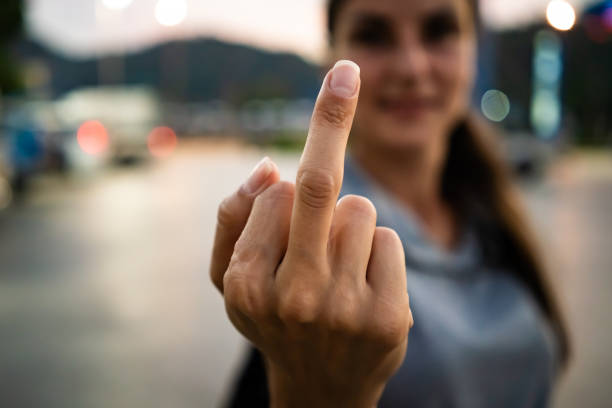 istock Young Woman Showing  Finger Sign 1134275479