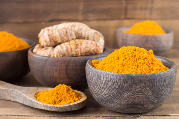 istock Turmeric powder and fresh turmeric. Curcuma longa 1134275541