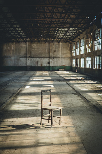 A Chair In The Abandoned Factory Building