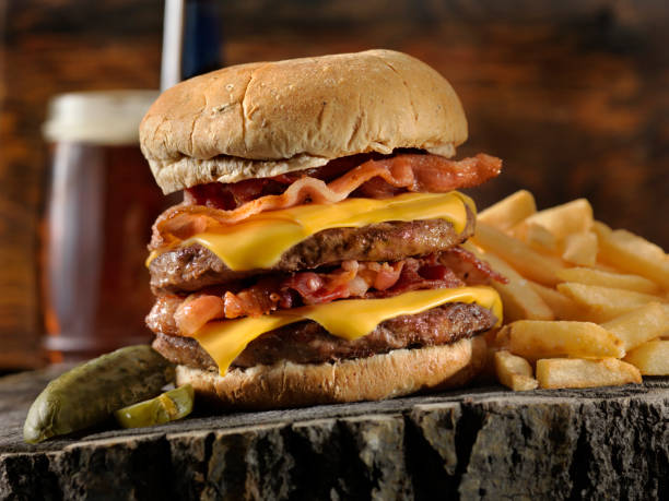 istock Bacon Double Cheeseburger with Fries and a Beer 1134276636