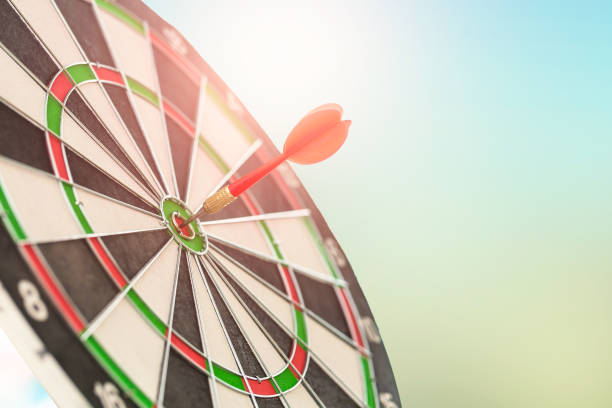istock Circular target marked with dart with defocused or blurred bokeh background. 1134276792