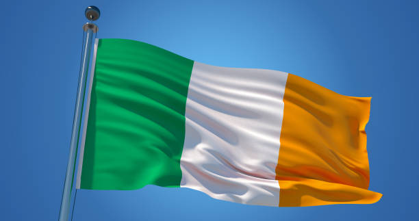 istock Ireland flag in the wind against clear blue sky, 3d illustration 1134277685