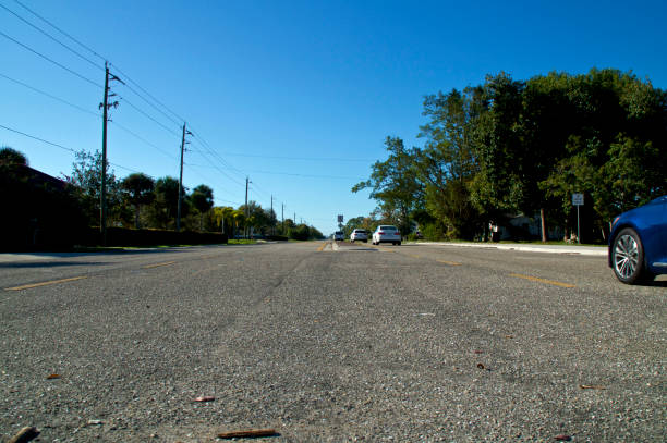 istock low angle view of wide open road with traffic 1134278357