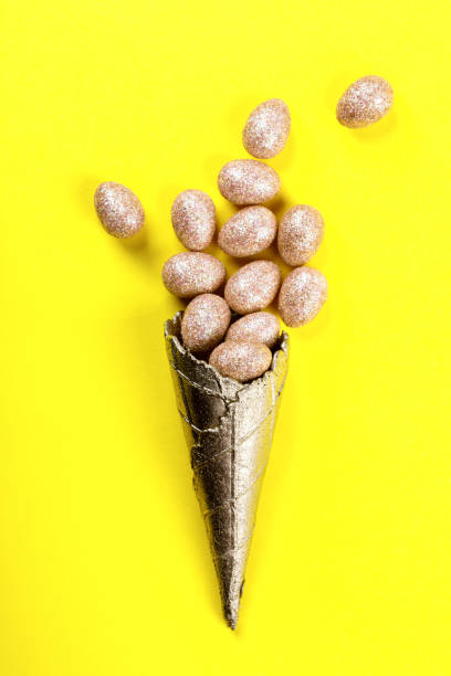 istock Happy Easter background  with Easter eggs golden color on yellow paper.Festive concept.Top View. Flat Lay.Copy space for Text. 1134279624