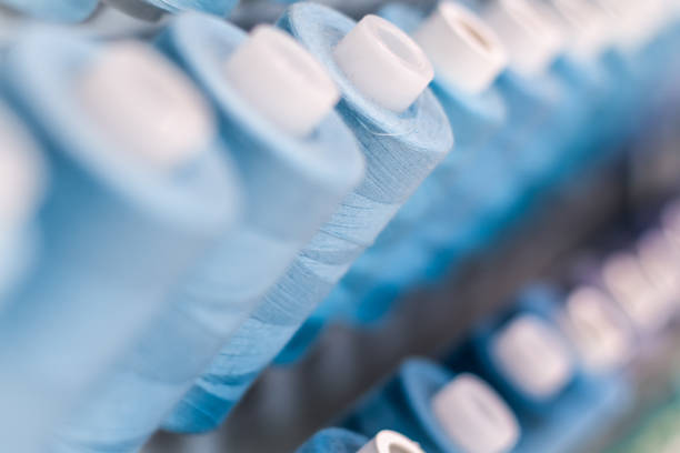 Background with a lot of blue  threads.  stacked in a rows,  Selective focus.blue tone pallet. background