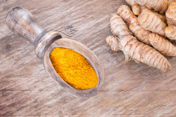 istock Turmeric powder and fresh turmeric. Curcuma longa 1134280203