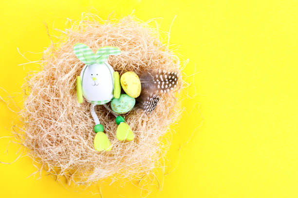 istock Easter background. Easter eggs  Colored, decorated with gold on yellow paper. Happy Festive concept.Top View. Flat Lay.Copy space for Text 1134280398