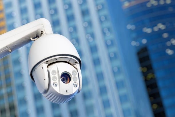 istock Modern CCTV camera with business buildings in the background 1134280406
