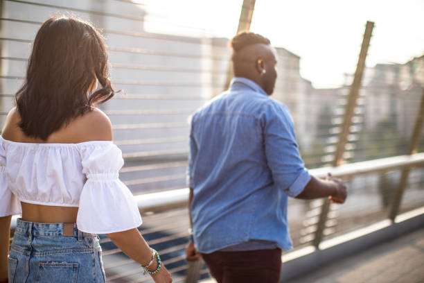 istock Interracial couple walking in Milan 1134282803