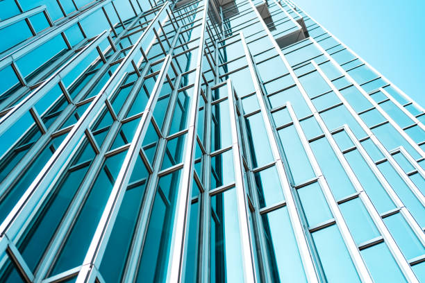 istock underside panoramic and perspective view to steel blue glass high rise building skyscrapers, business concept of successful industrial architecture 1134283097