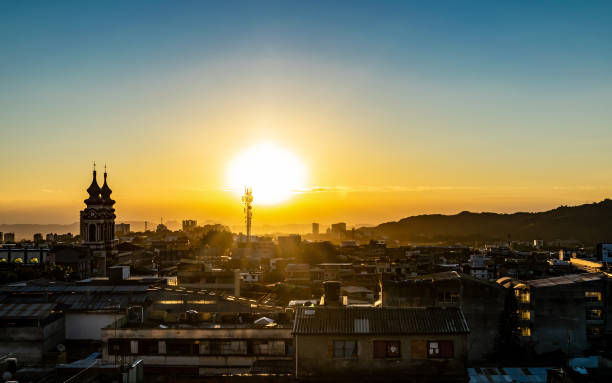 Beautiful golden sunrise over the downtown of Ibague Beautiful golden sunrise over the downtown of Ibague Tolima in Colombia tolima stock pictures, royalty-free photos & images