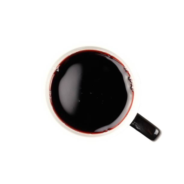 istock Pomegranate juice in a mug. Close up. Top view. Isolated on white background 1134287840
