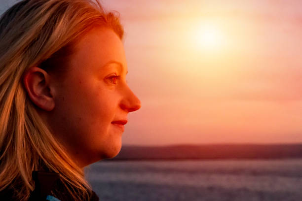 istock young blond woman on beach 1134288052