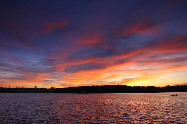 istock Beautiful romantic sunset over a calm lake 1134288944