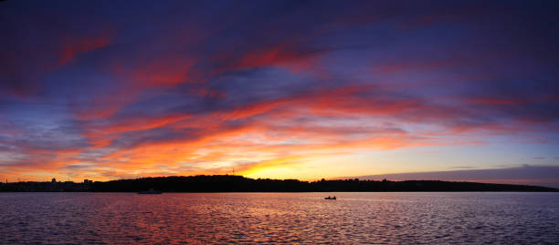 istock Beautiful romantic sunset over a calm lake 1134289042