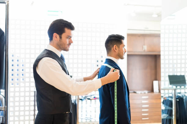 istock Taking Measurements For Formal Suit At Rental Shop 1134289062