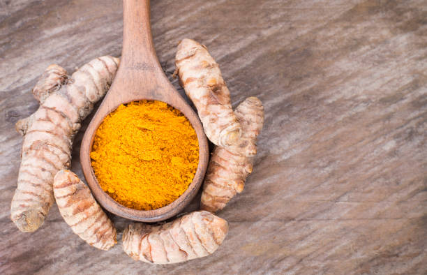 istock Turmeric powder and fresh turmeric. Curcuma longa 1134289773