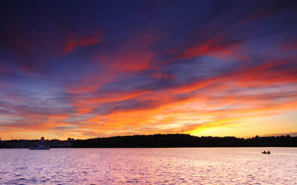 istock Beautiful romantic sunset over a calm lake 1134290294