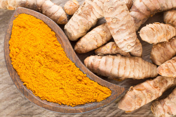 istock Turmeric powder and fresh turmeric. Curcuma longa 1134290997