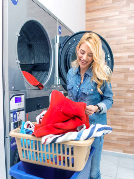 istock Young woman having a laundry day 1134295609