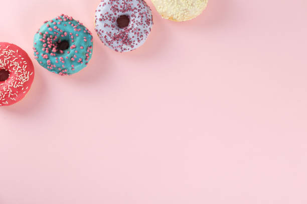 istock Minimal composition in vibrant colors with bright glaze donuts. 1134297175
