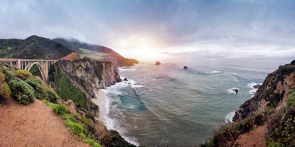 Photo of Bixby Creek Bridge at located at California State Route 1. Cloudy day.