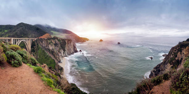 Bixby Creek Bridge at California State Route 1 Photo of Bixby Creek Bridge at located at California State Route 1. Cloudy day. big sur stock pictures, royalty-free photos & images