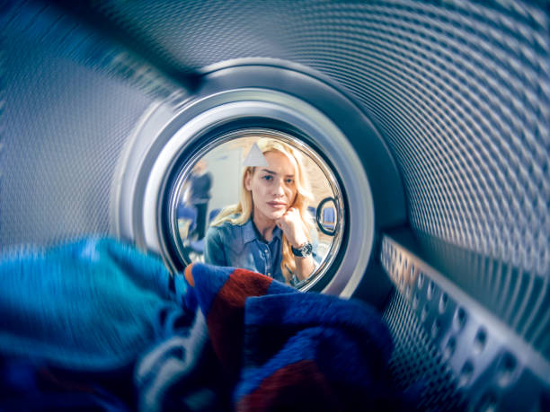 istock Young woman having a laundry day 1134298981
