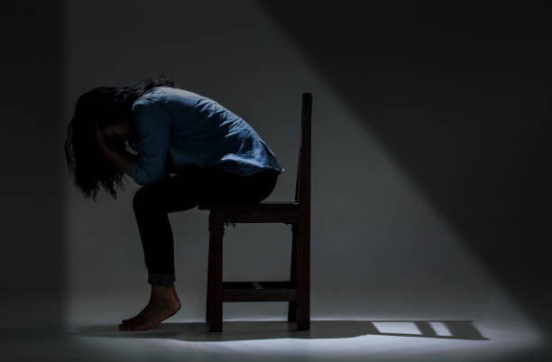 istock An Asian woman is suffering from depression. 1134299385