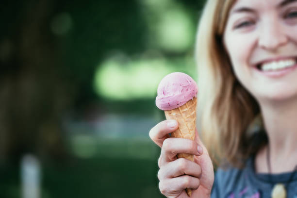 istock Girl enjoys ice cream in the summer 1134301310