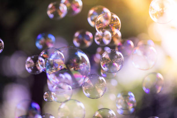 istock Soap bubbles floating in the air, summer time 1134301332