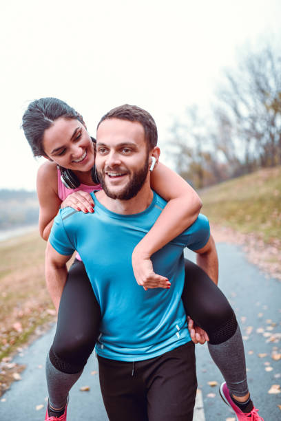 istock Adorable Couple Having Fun Together On Running Track 1134301344