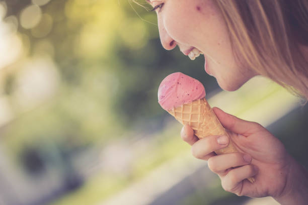 istock Girl enjoys ice cream in the summer 1134301366