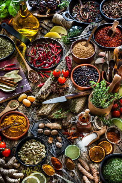 istock Spices and herbs shot from above on rustic wooden table 1134301498