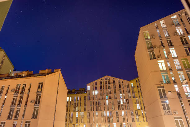 istock Yellow buildings and stars on the sky 1134302590