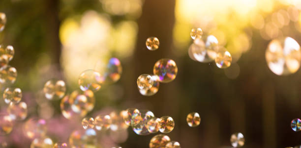 istock Soap bubbles floating in the air, summer time 1134302736