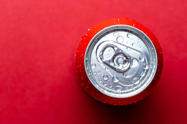 red Aluminum can over red background. stock photo