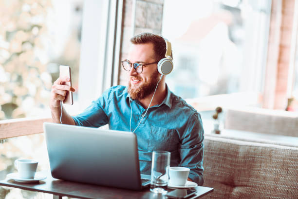 istock Male Freelancer Establishing Video Conference While Drinking Morning Coffee 1134306914