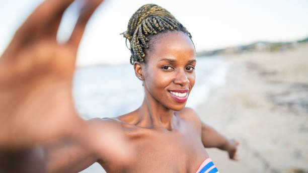 istock Portrait of Afro woman using hands to make a frame 1134308615