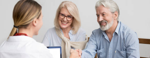 istock Senior spouses feels happy make deal shaking hands with agent 1134312218