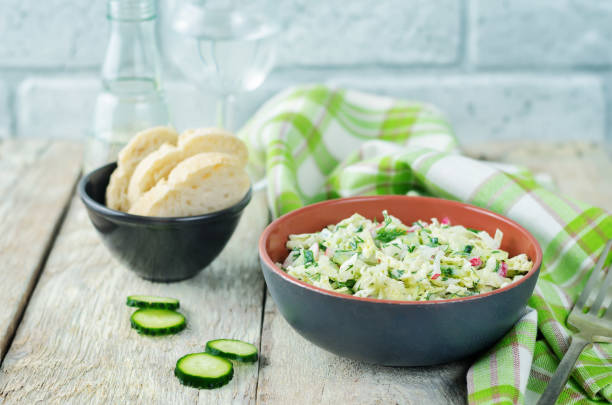 istock Cabbage radish cucumber dill salad with greek yogurt dressing 1134315551
