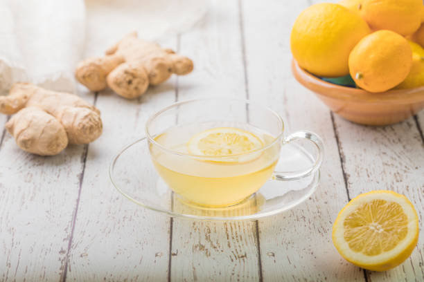 homemade cough and cold relief drink - ginger tea cup cold and flu tea imagens e fotografias de stock