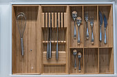 Kitchen tools in an open drawer