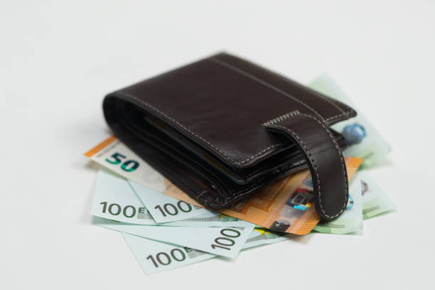 istock Money. Euro. Dollar bills are on a white background. 1134320220