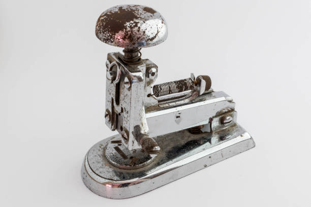 Metal Stapler Antique metal stapler on white background documento stock pictures, royalty-free photos & images