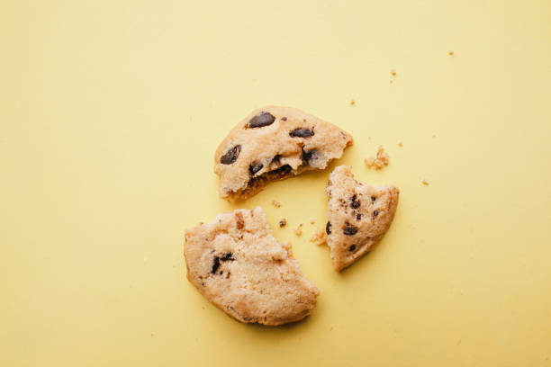 istock pieces of broken cookie, diet, part, sharing 1134331503