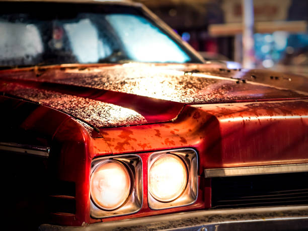 classic red car and headlights for table or wallpapers or cover