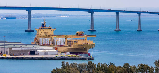 Dole Freighter at Dock SAN DIEGO, CALIFORNIA - May 11, 2016: San Diego is the  8th largest city in the country and  2ndlargest in California. It's main economic sources are military, tourism, trade and manufacturing. dole stock pictures, royalty-free photos & images