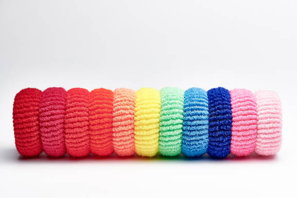 A row of bright multi-colored scrunchy.